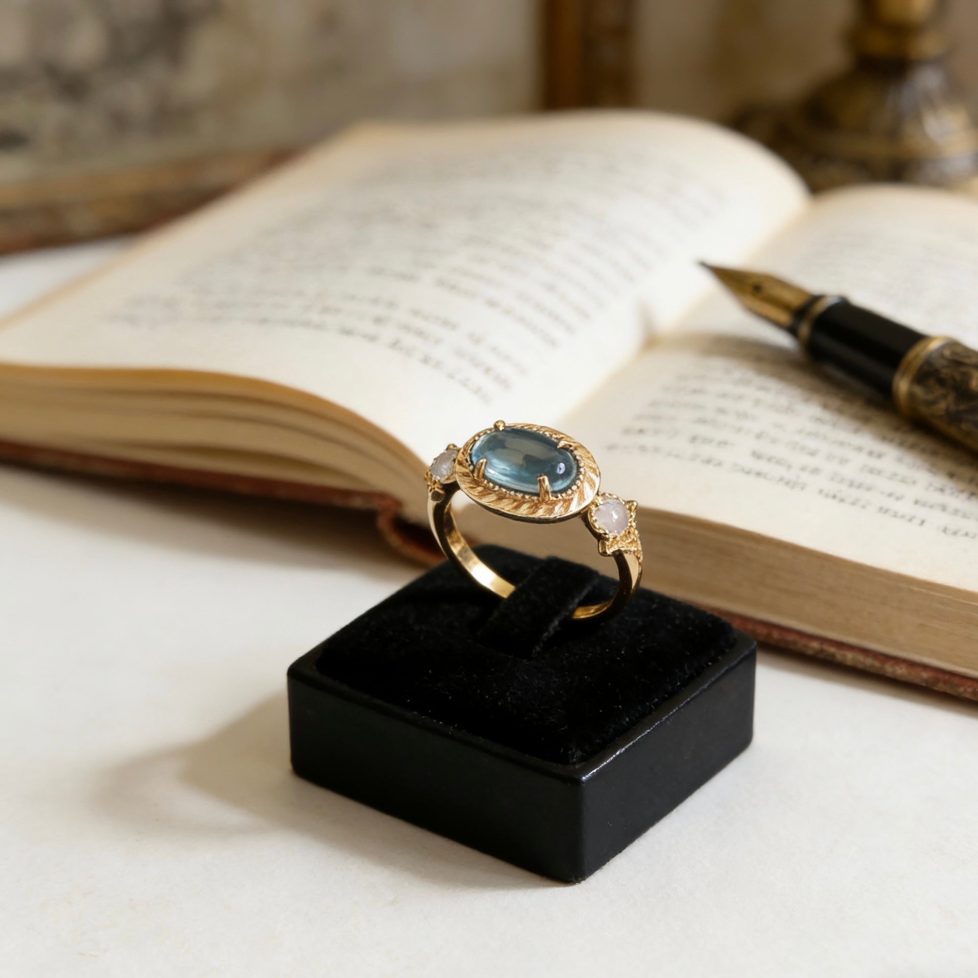 Serenity Glow Oval Blue Topaz Textured Gold Ring