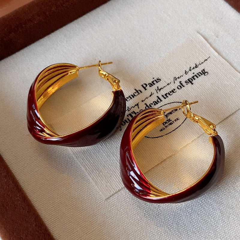Vintage Luxury Gold-Plated Enamel Wine-Red Twisted C-Shaped Earrings