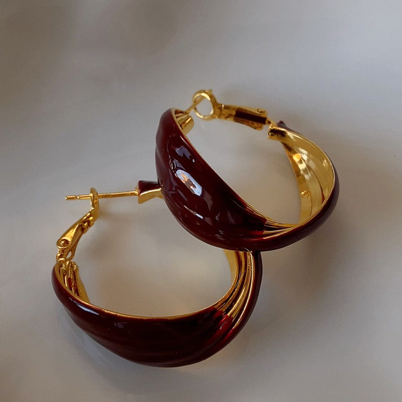 Vintage Luxury Gold-Plated Enamel Wine-Red Twisted C-Shaped Earrings