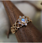 Vintage-Luxury Gold-Plated Hollow-Patterned Multi-Round Zircon Oval Moonstone Ring