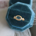 Gold-Plated Twisted Blue Oval Topaz Ring