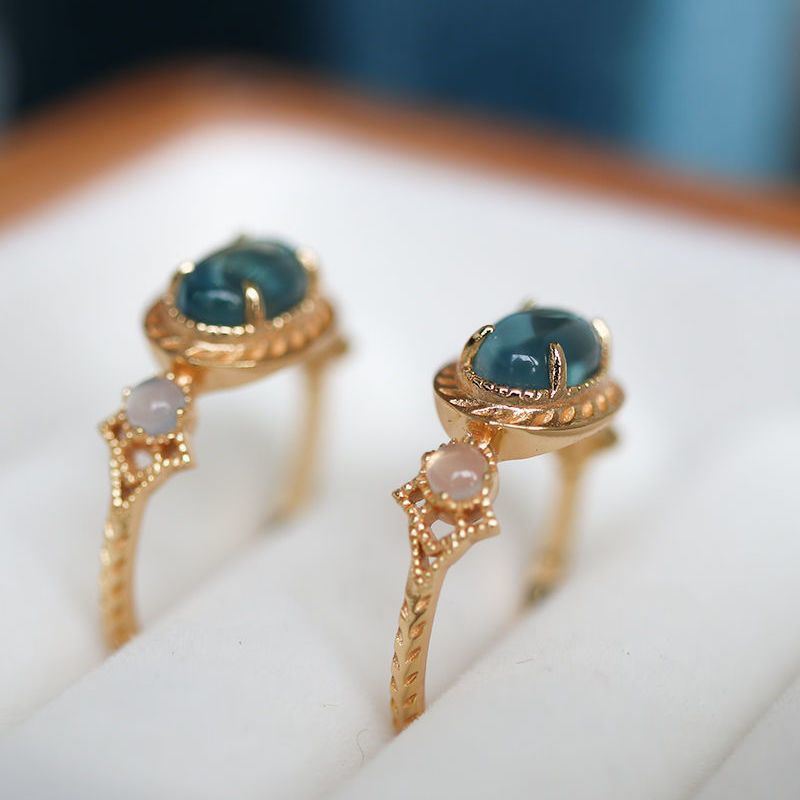 Gold-Plated Twisted Blue Oval Topaz Ring